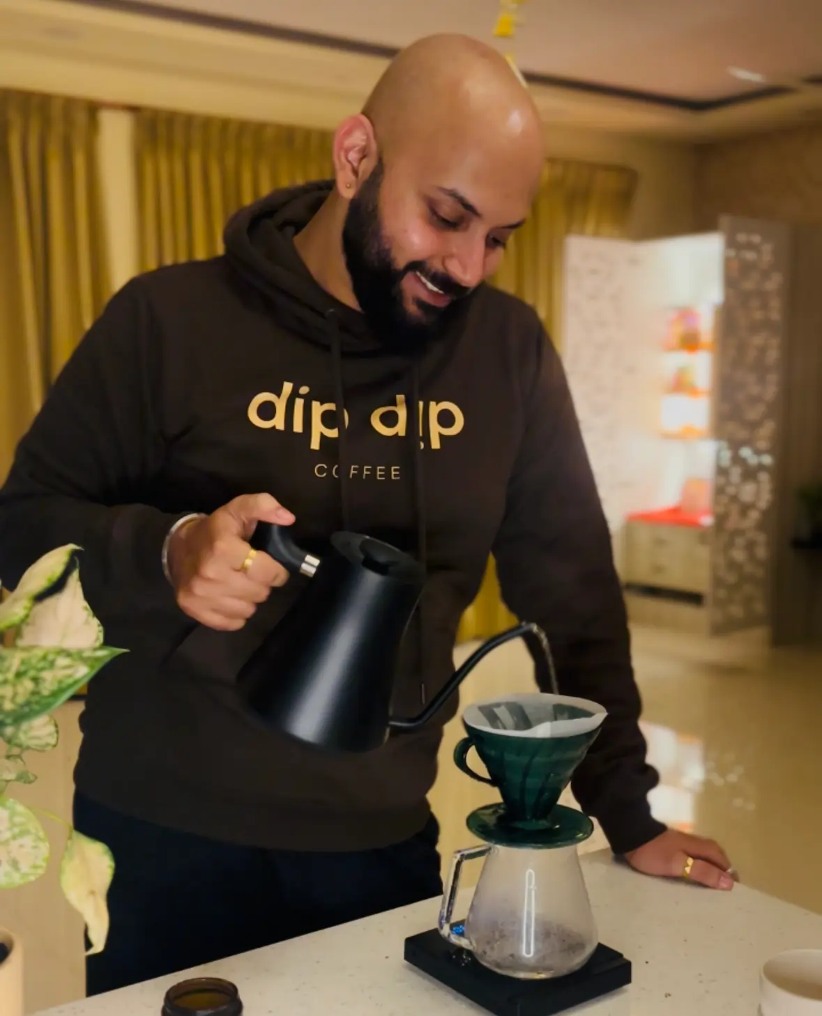 Manas brewing pourover coffee